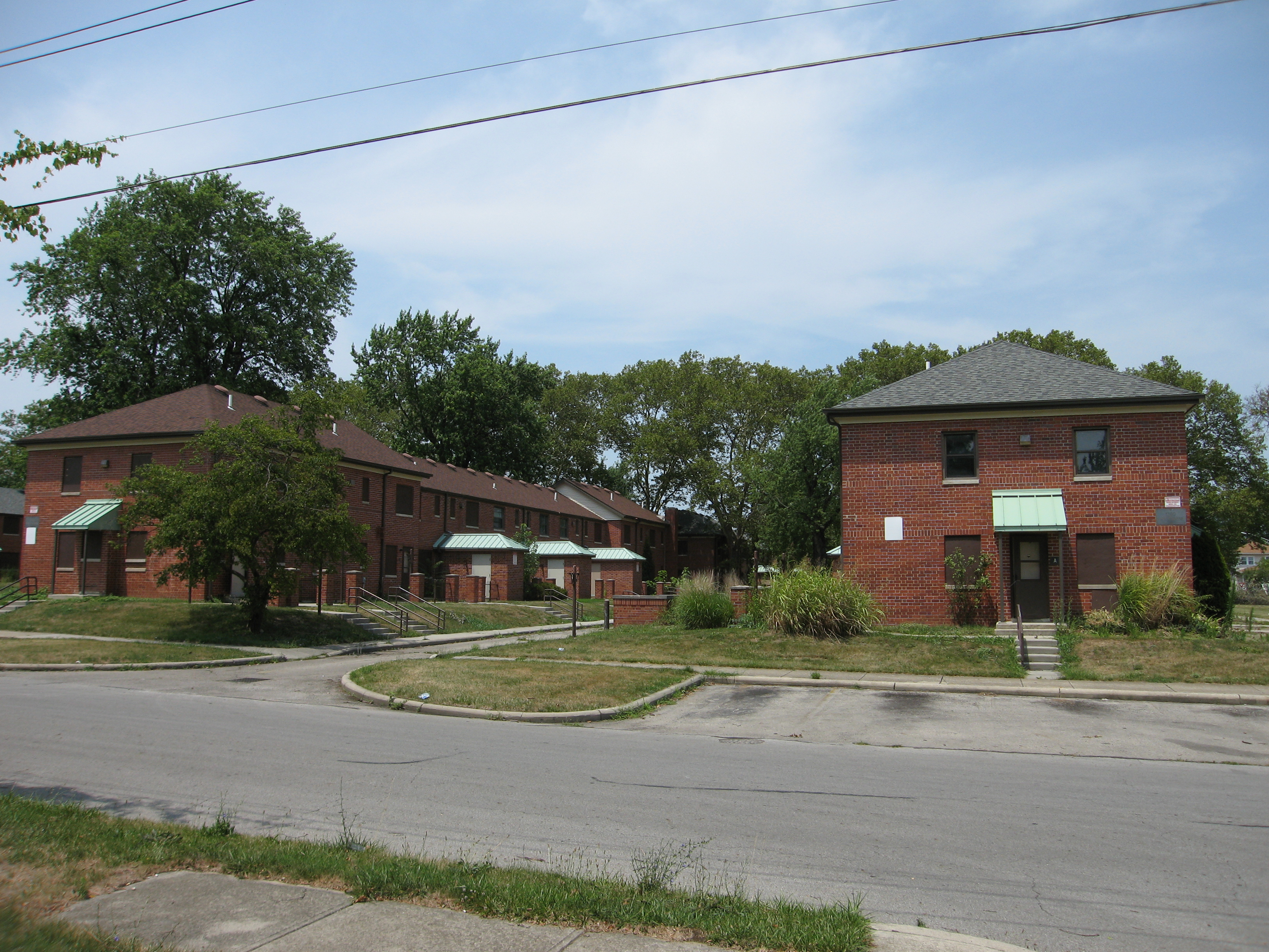 Poindexter Village btw Winner and Hughes Hardlines Design Company